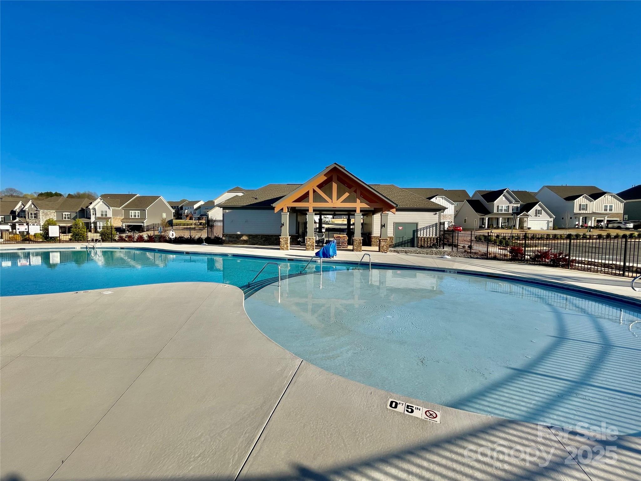 278 West Waterlynn Road Mooresville, NC 28117 - Photo 39 of 46 a view of a swimming pool and an outdoor seating