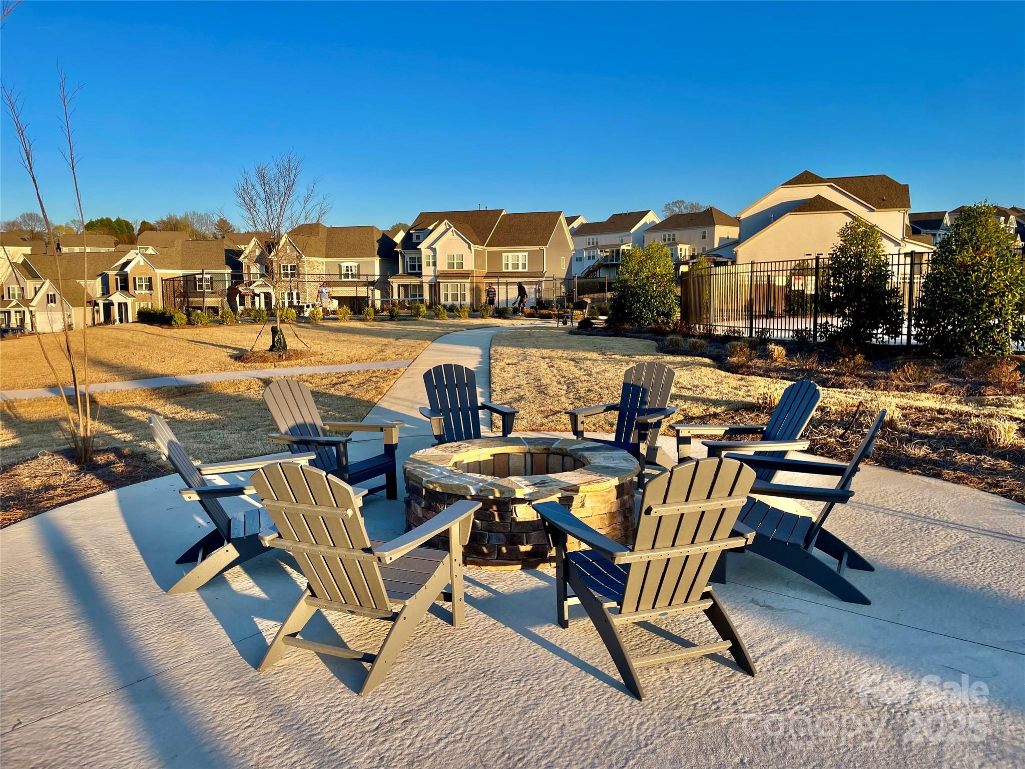 278 West Waterlynn Road Mooresville, NC 28117 - Photo 42 of 46 a view of a swimming pool with outdoor seating and city view