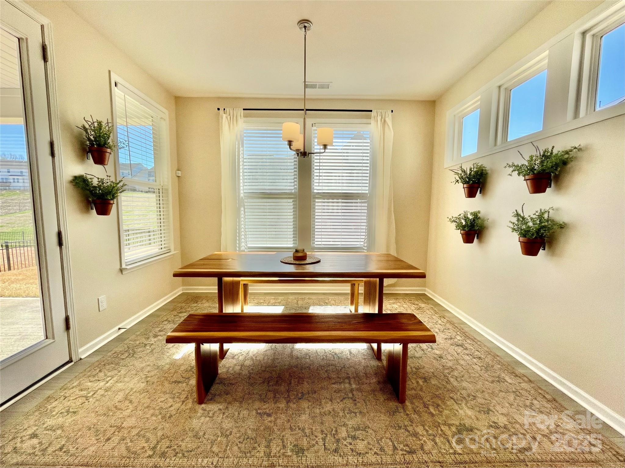 278 West Waterlynn Road Mooresville, NC 28117 - Photo 9 of 46 a living room with a table