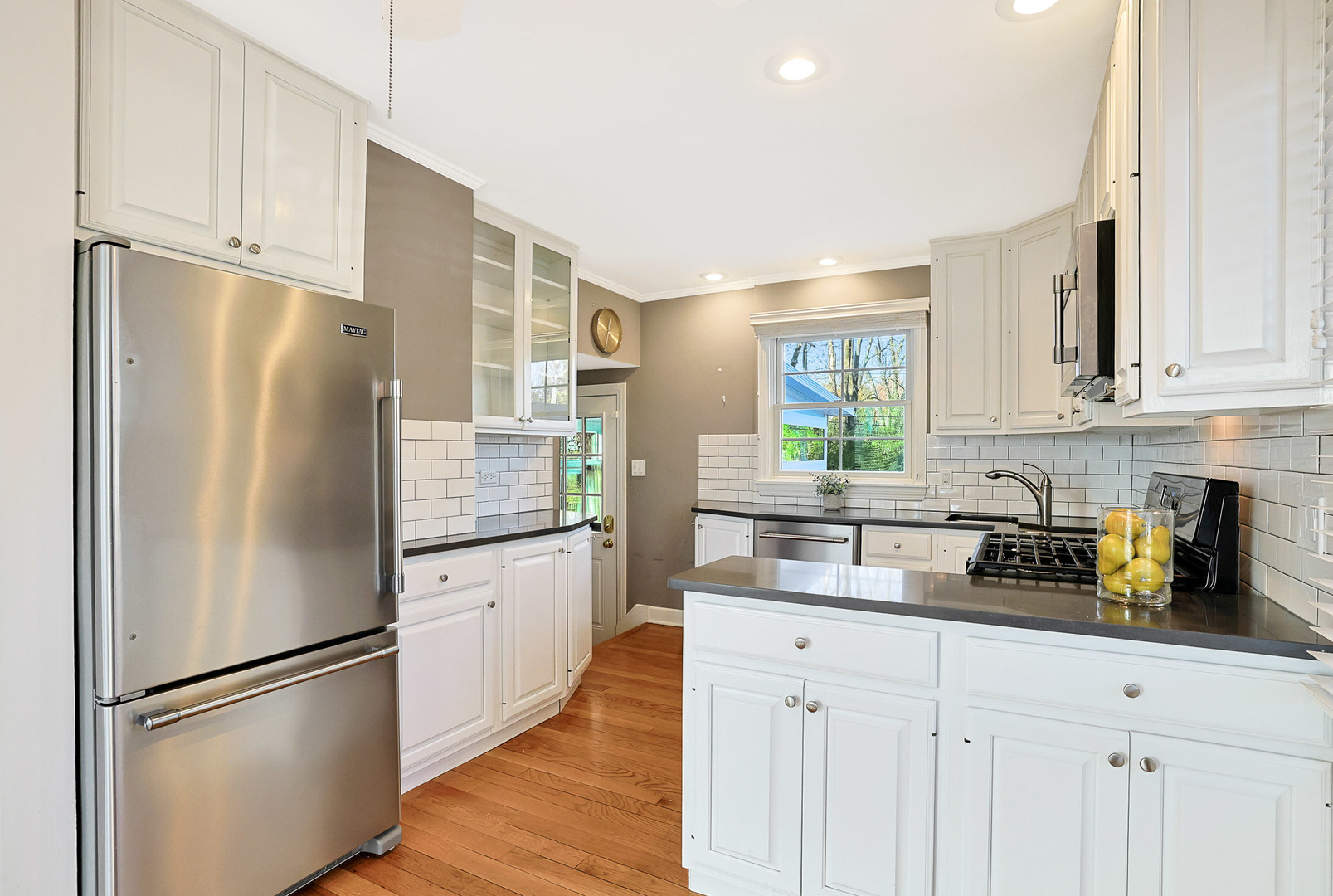 120 South Rohlwing Road Palatine, IL 60074 - Photo 11 of 49 a kitchen with stainless steel appliances a refrigerator sink and cabinets