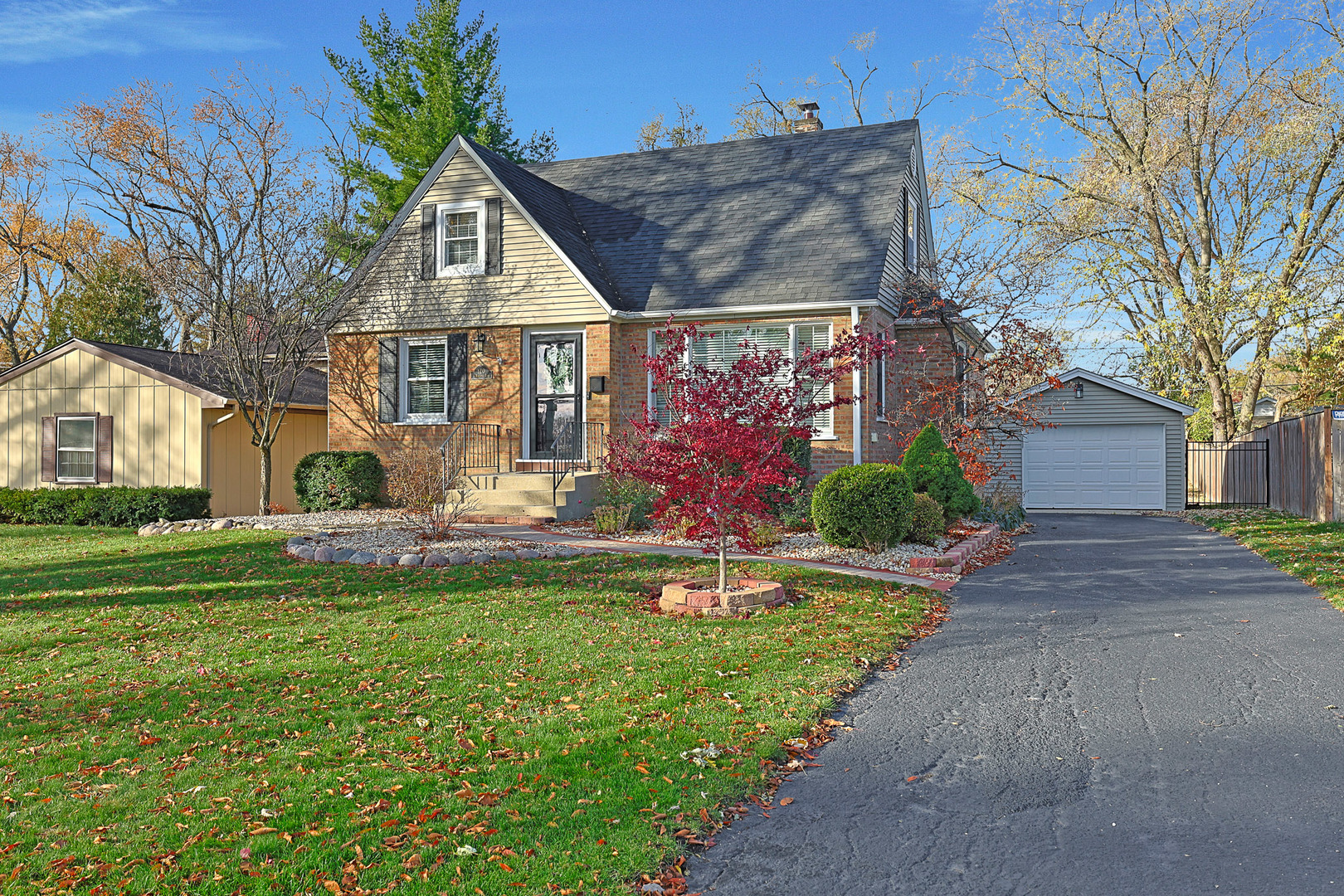 120 South Rohlwing Road Palatine, IL 60074 - Photo 2 of 49 a front view of house with garden