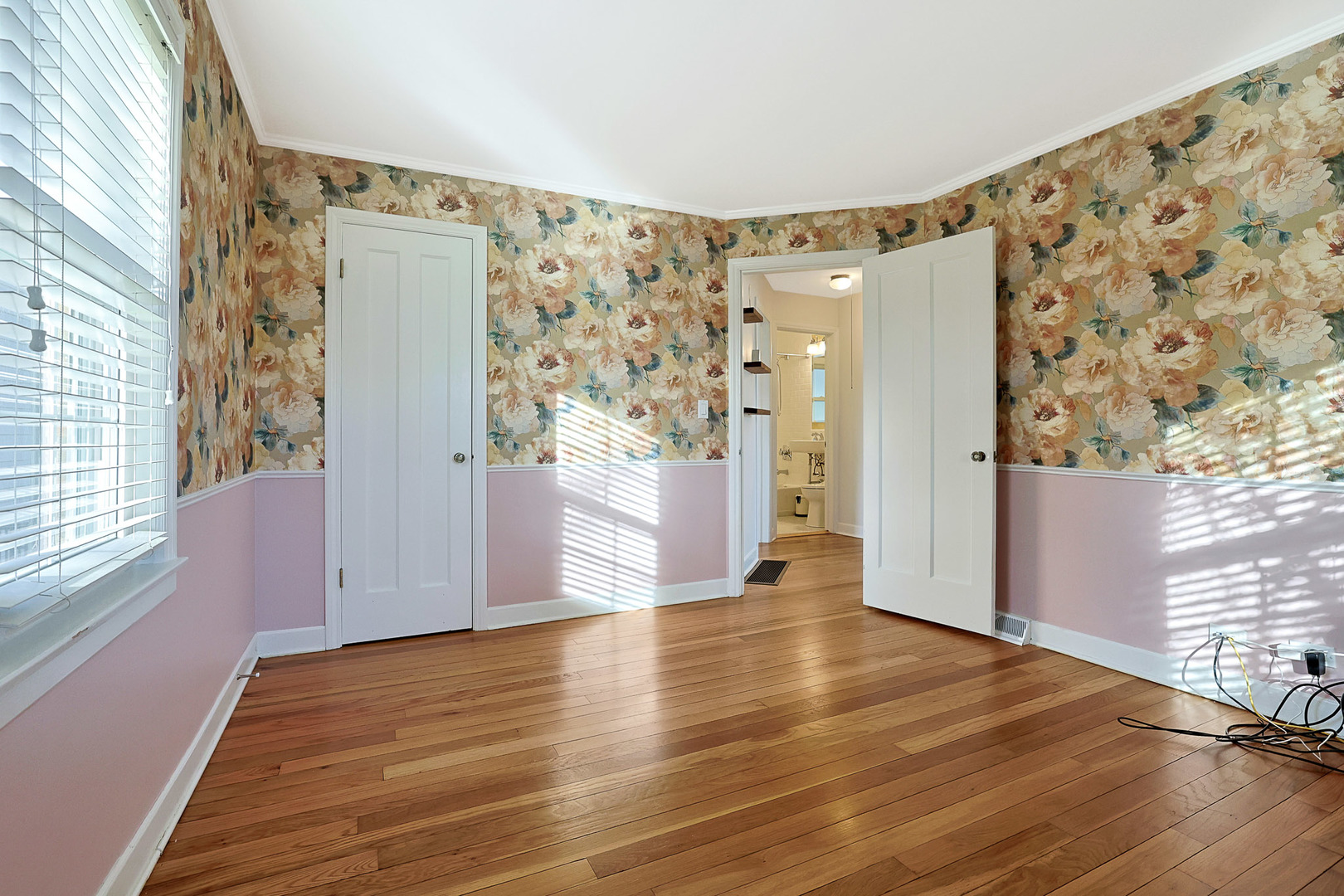 120 South Rohlwing Road Palatine, IL 60074 - Photo 23 of 49 a view of a big room with wooden floor and windows