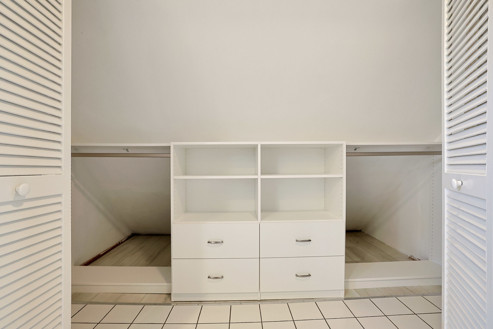 120 South Rohlwing Road Palatine, IL 60074 - Photo 31 of 49 a view of an empty walk in closet