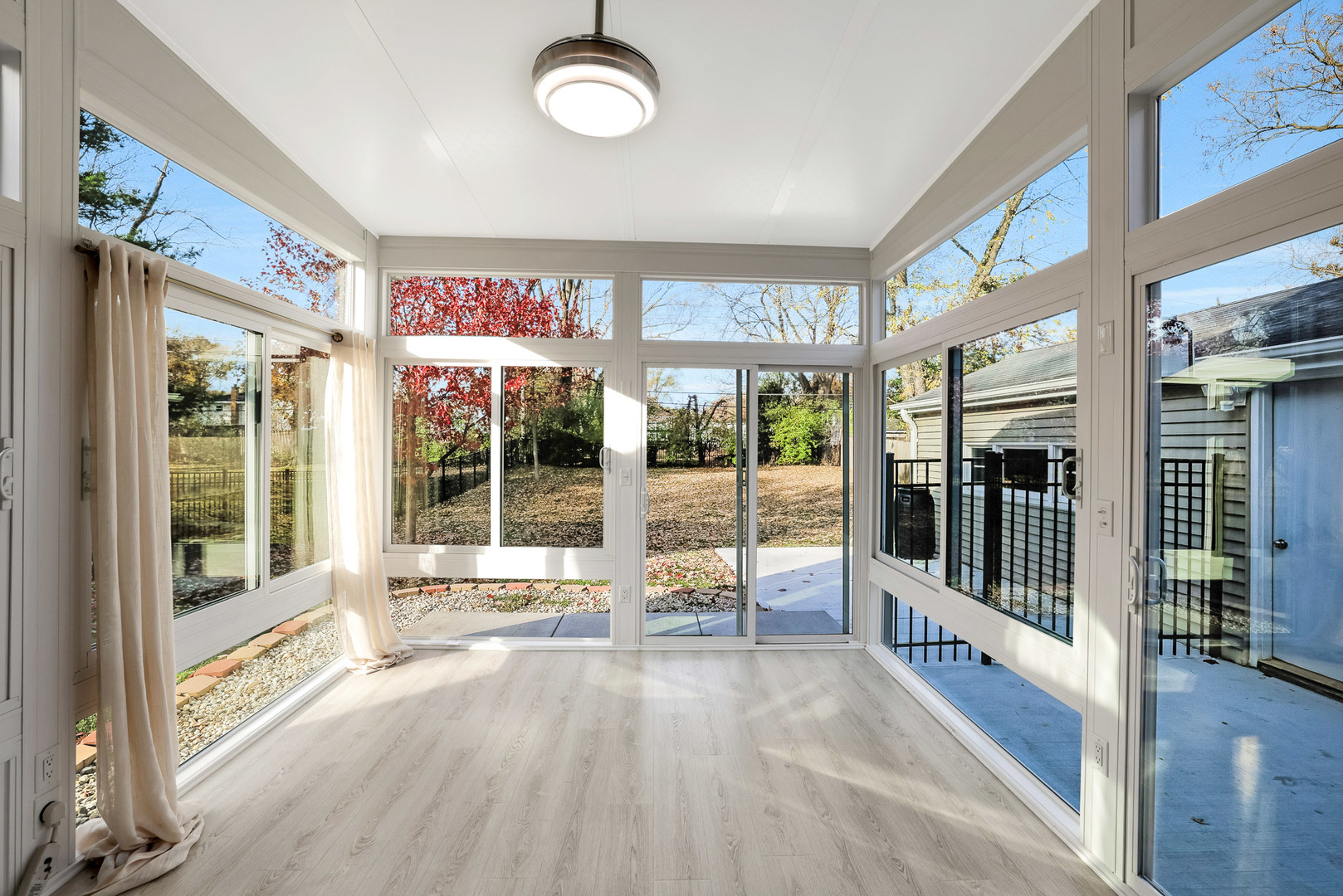 120 South Rohlwing Road Palatine, IL 60074 - Photo 34 of 49 a view of an entryway with a floor to ceiling window