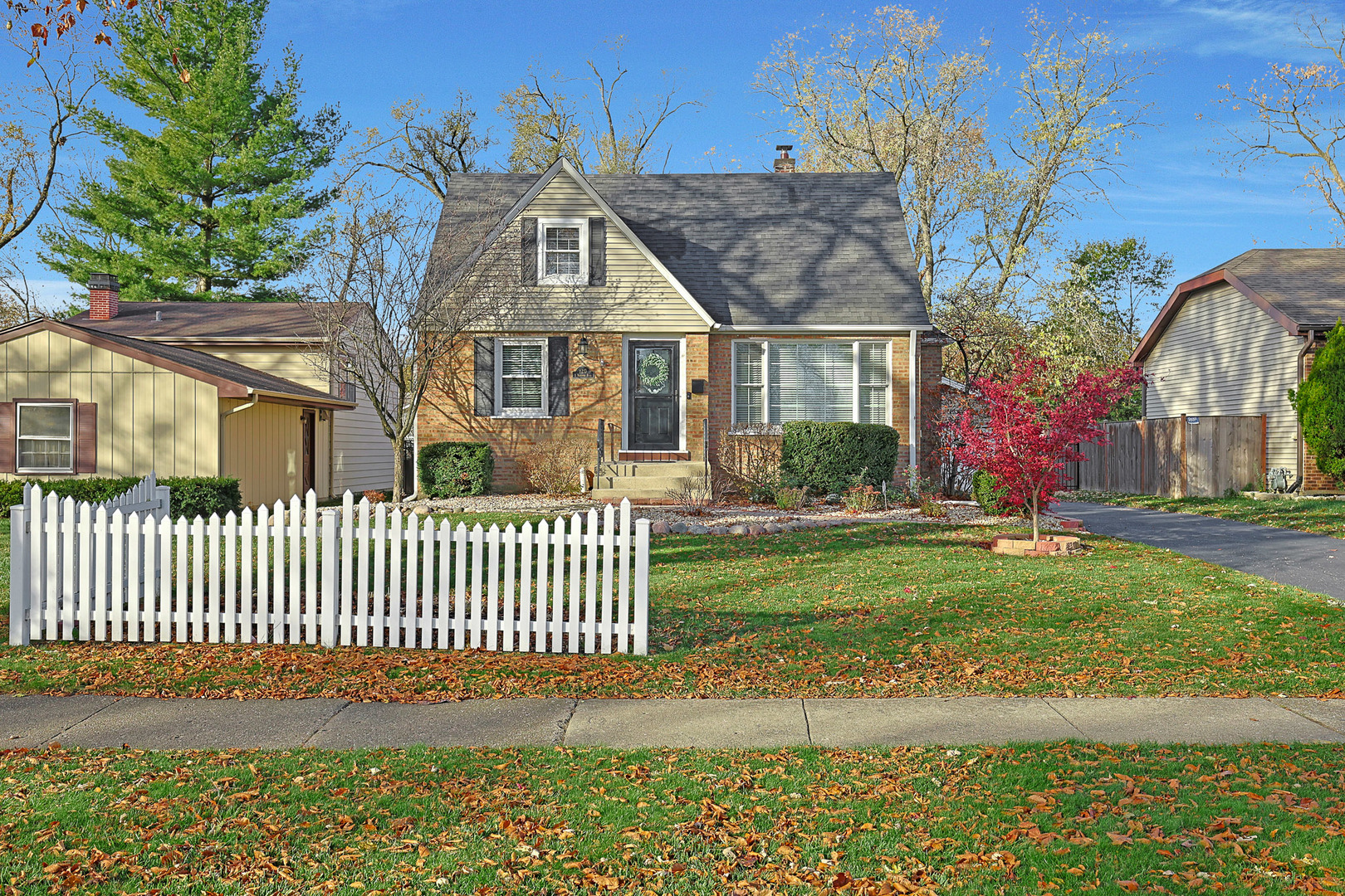 120 South Rohlwing Road Palatine, IL 60074 - Photo 49 of 49 a front view of a house with garden