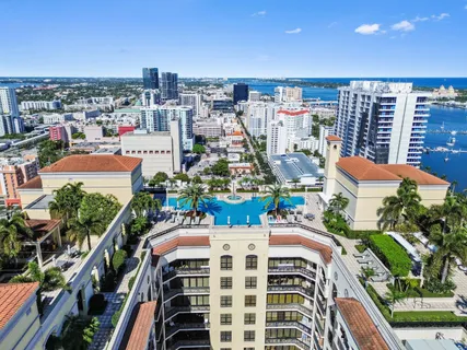 a view of a swimming pool with a lounge chair