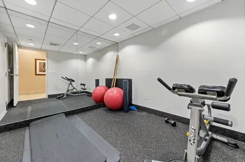 a view of a room with gym equipment