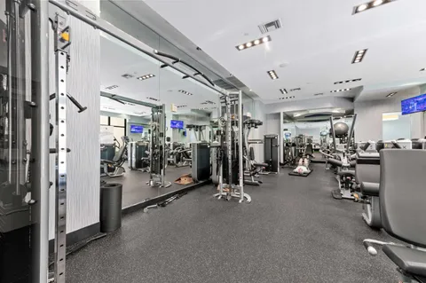 a living room with a couch and a flat screen tv