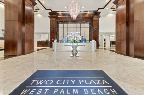 a view of a brick building with many windows