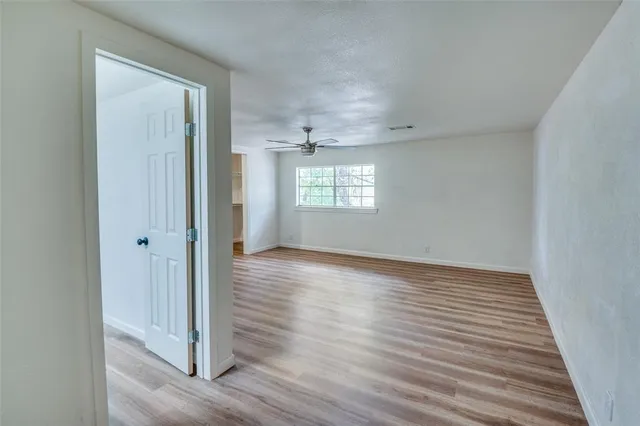 a kitchen with a sink cabinets and window