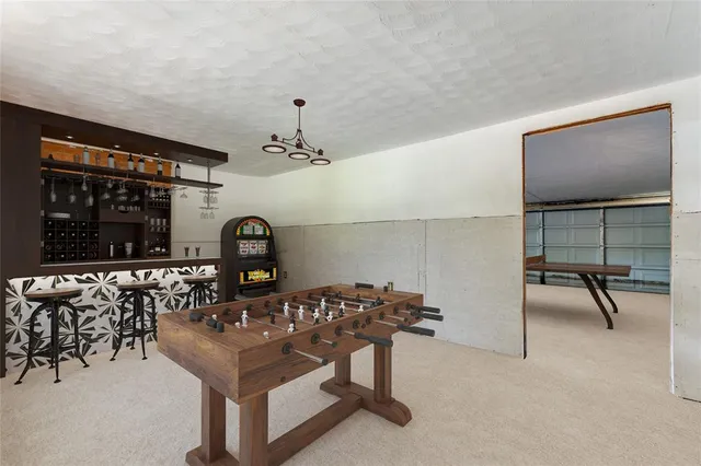 a bedroom with a bed and a mirror