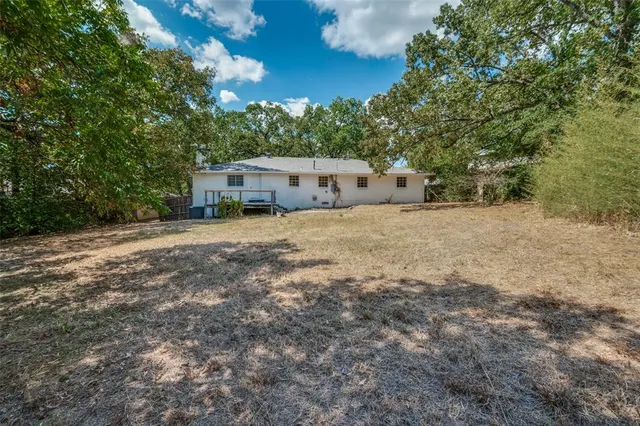 a view of an entryway with a door