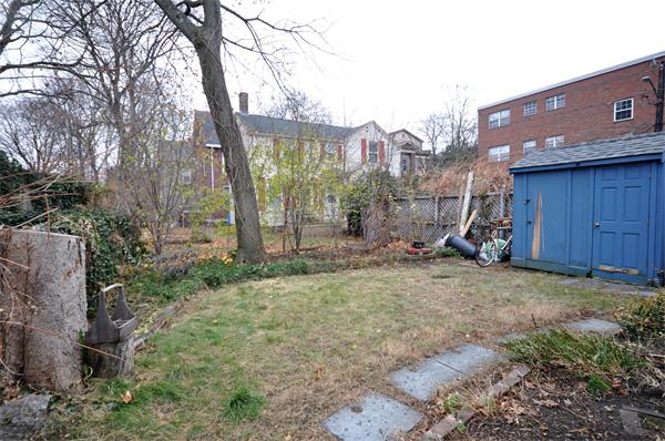 526 Centre Street, Unit 5 Boston, MA 02130 - Photo 14 of 14 a backyard of a house with lots of green space