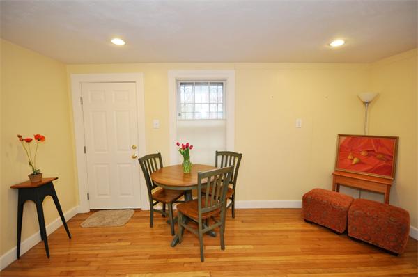 526 Centre Street, Unit 5 Boston, MA 02130 - Photo 5 of 14 a view of a dining room with furniture and wooden floor