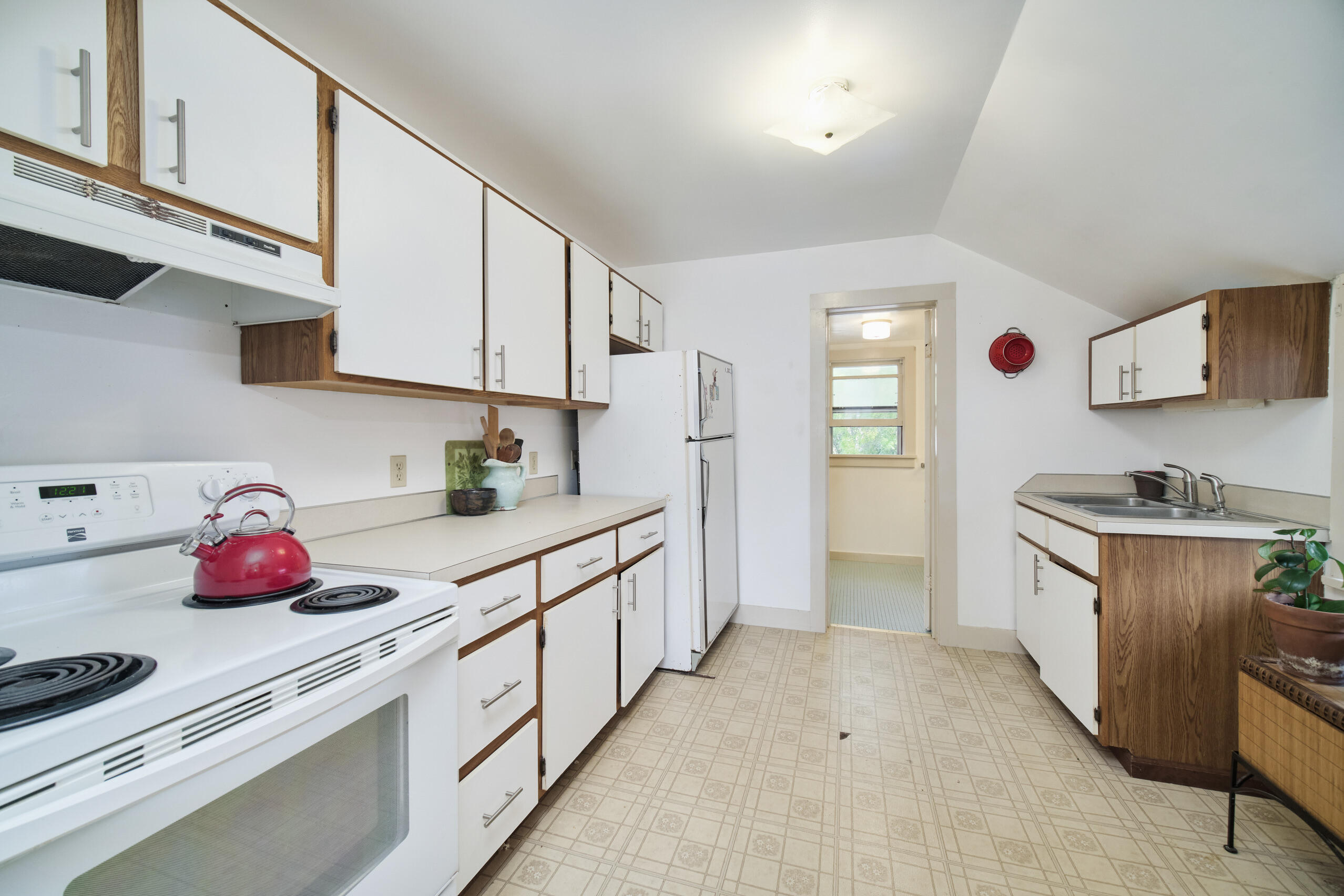 244 5th Street Manistee, MI 49660 - Photo 27 of 45 Kitchen has good counter & cabinet space