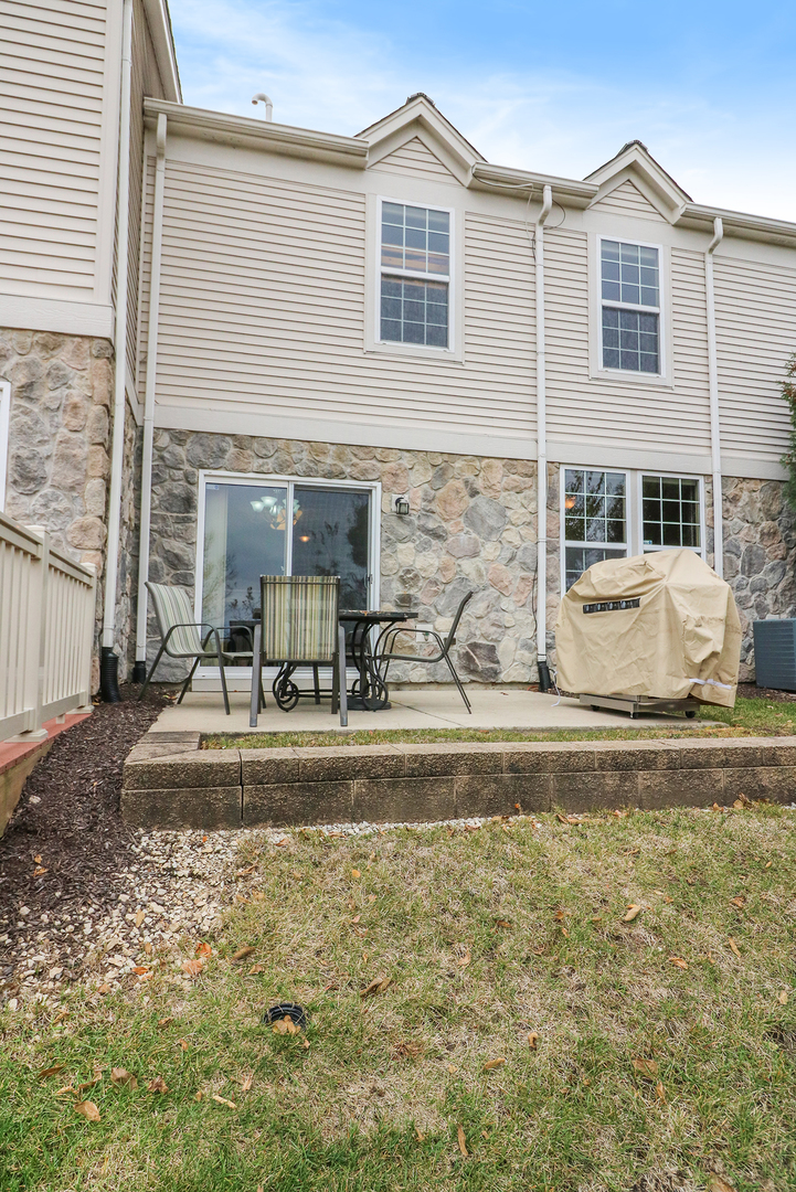 15261 Pinewood Road Lockport, IL 60441 - Photo 22 of 24 a view of a house with swimming pool and sitting area