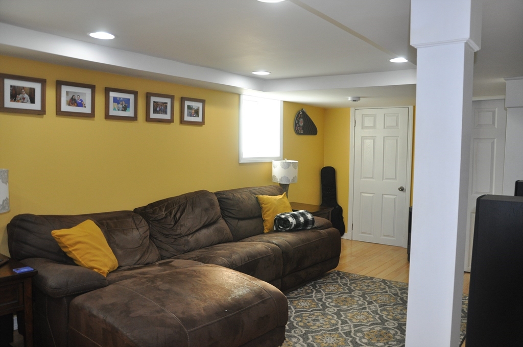 57 Crompton Street Acushnet, MA 02743 - Photo 12 of 21 a living room with furniture and a couch