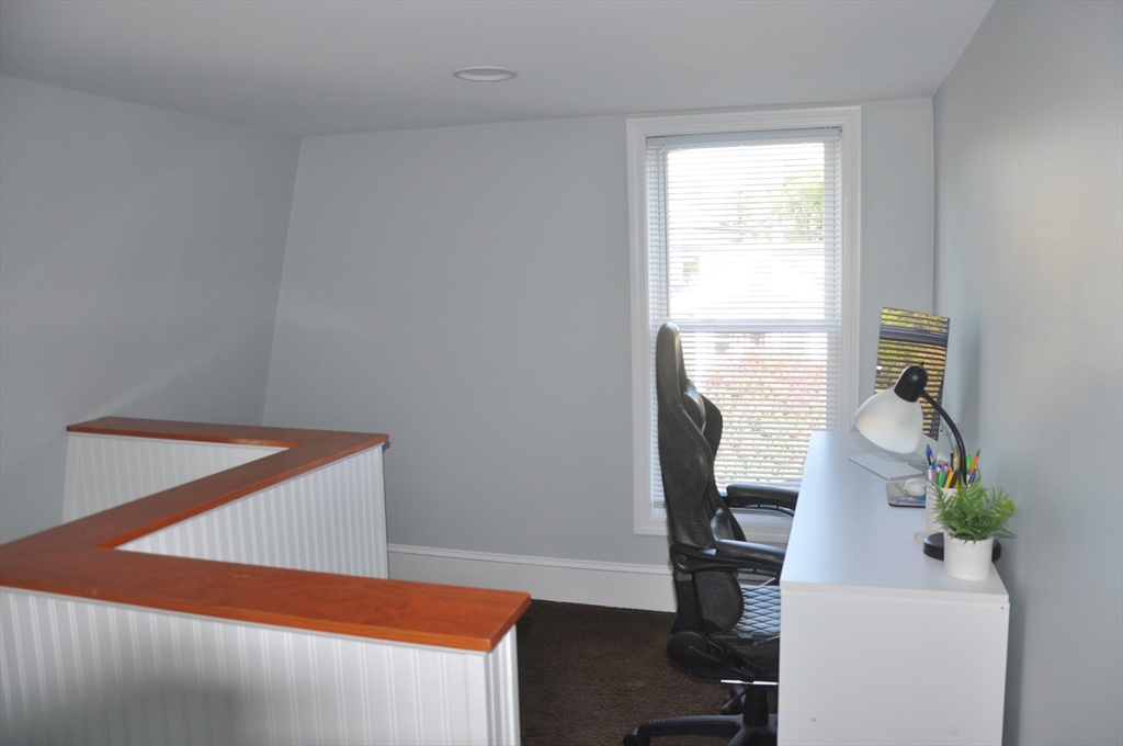 57 Crompton Street Acushnet, MA 02743 - Photo 16 of 21 a view of a room with gym equipment