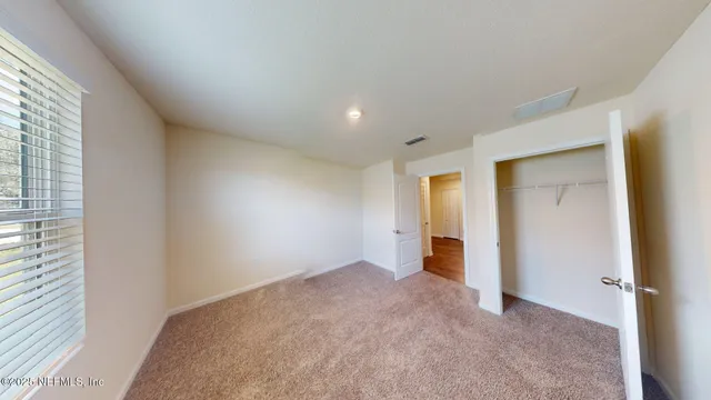 an empty room with a natural light