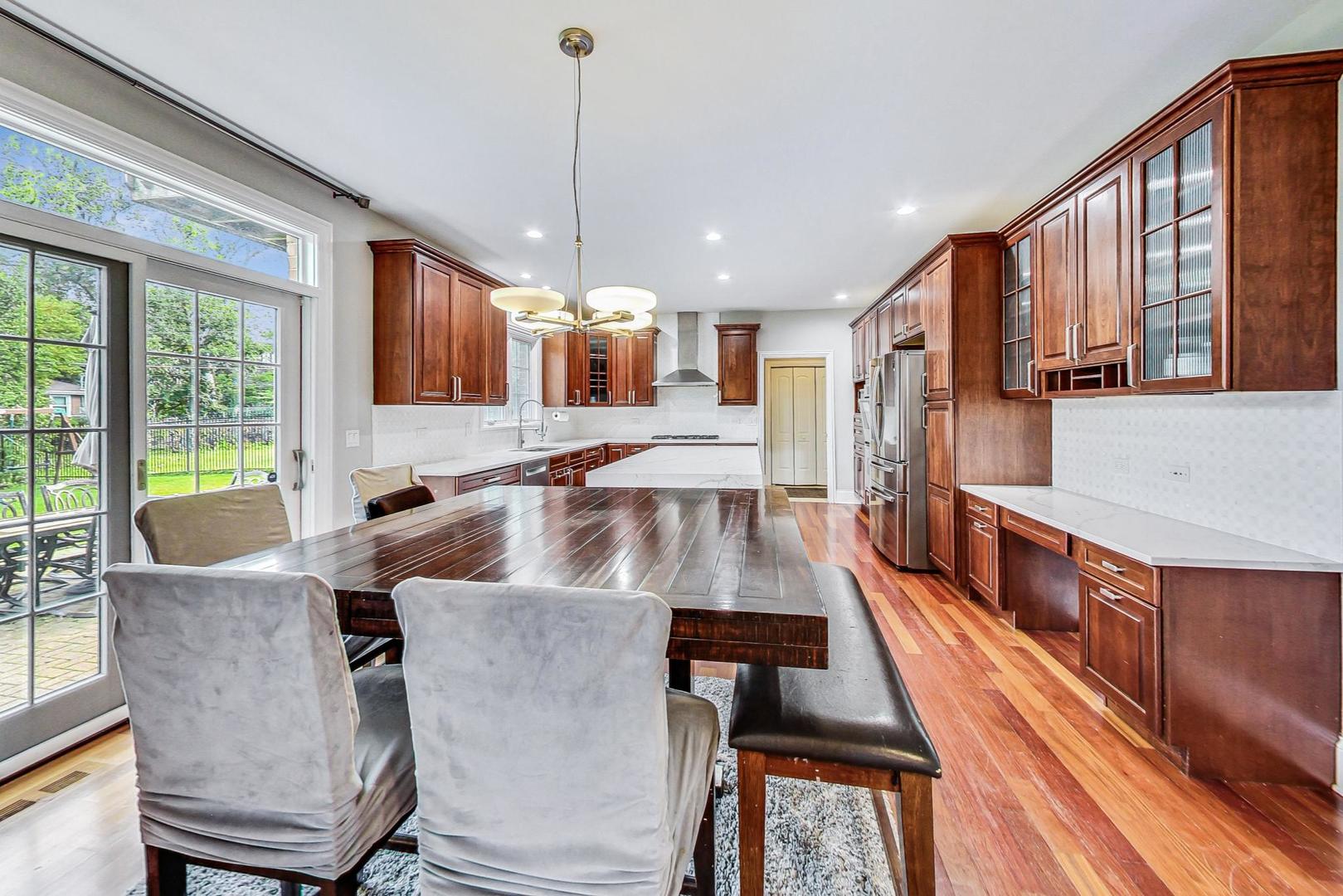 321 Forest Drive Addison, IL 60101 - Photo 7 of 35 a large kitchen with kitchen island a large window