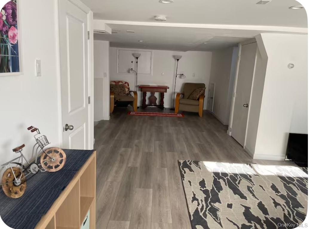 137 Canterbury Road Fort Montgomery, NY 10922 - Photo 14 of 20 a living room with furniture and a wooden floor