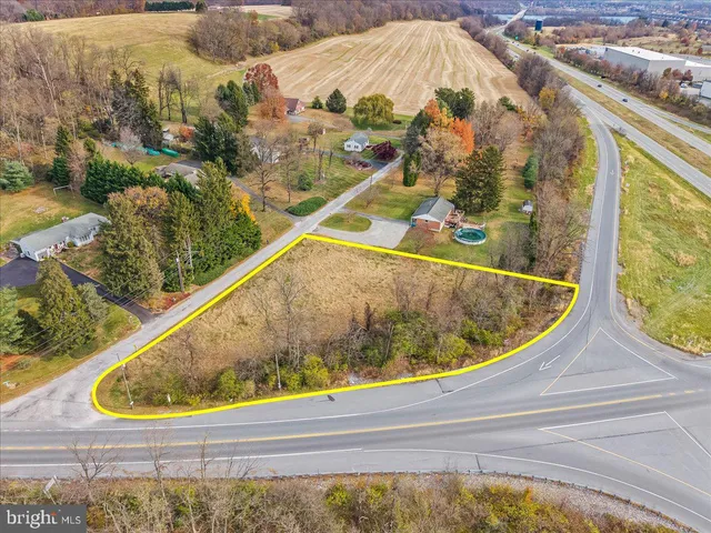 a view of a swimming pool with a outdoor seating