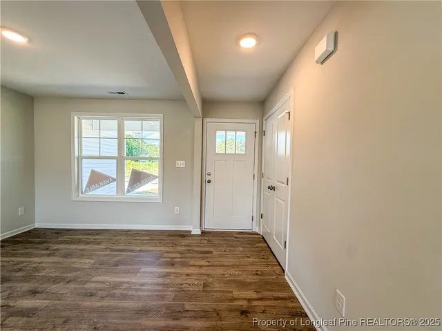 an empty room with windows