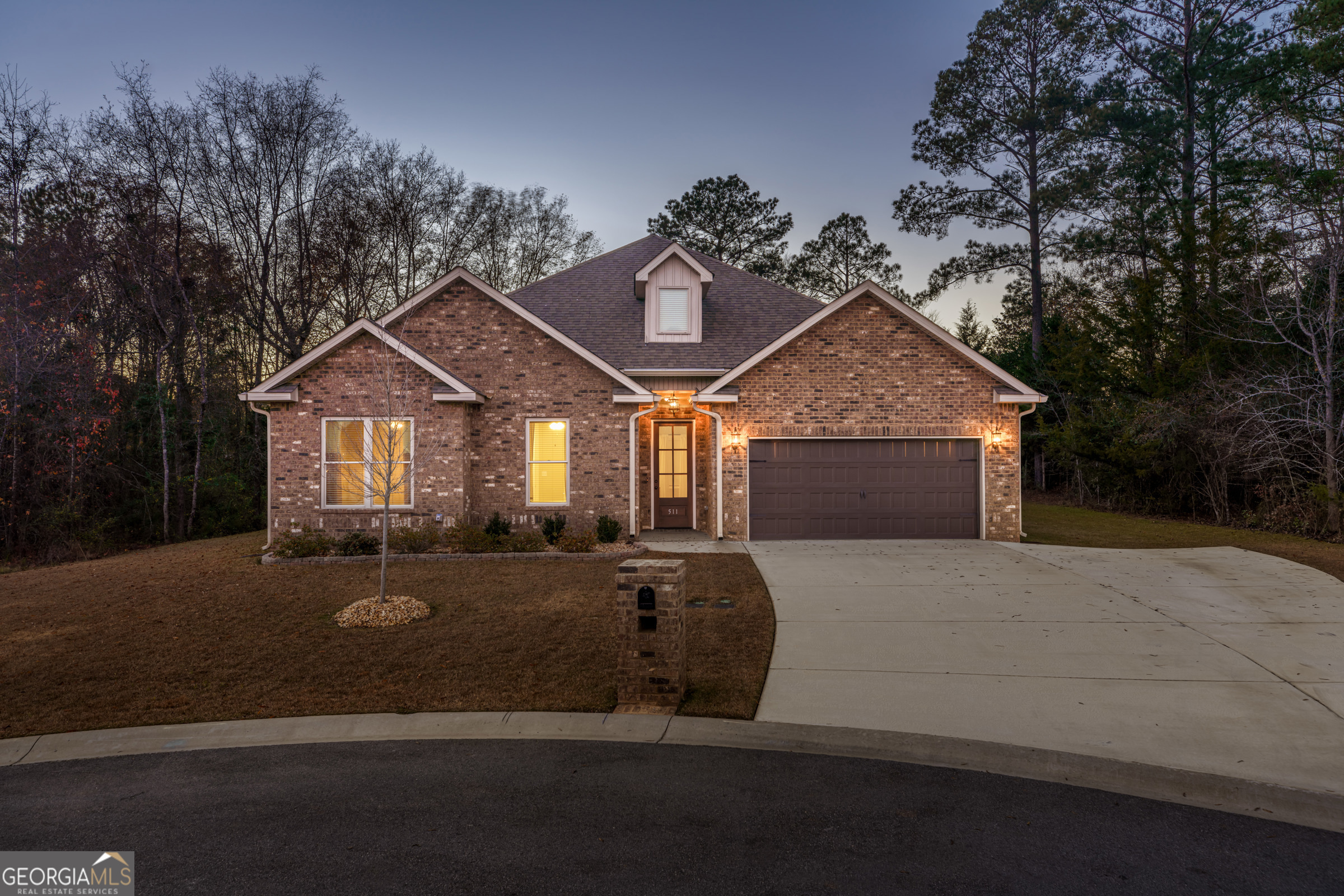511 Clifton Road Perry, GA 31069 - Photo 1 of 1 a front view of a house with a yard