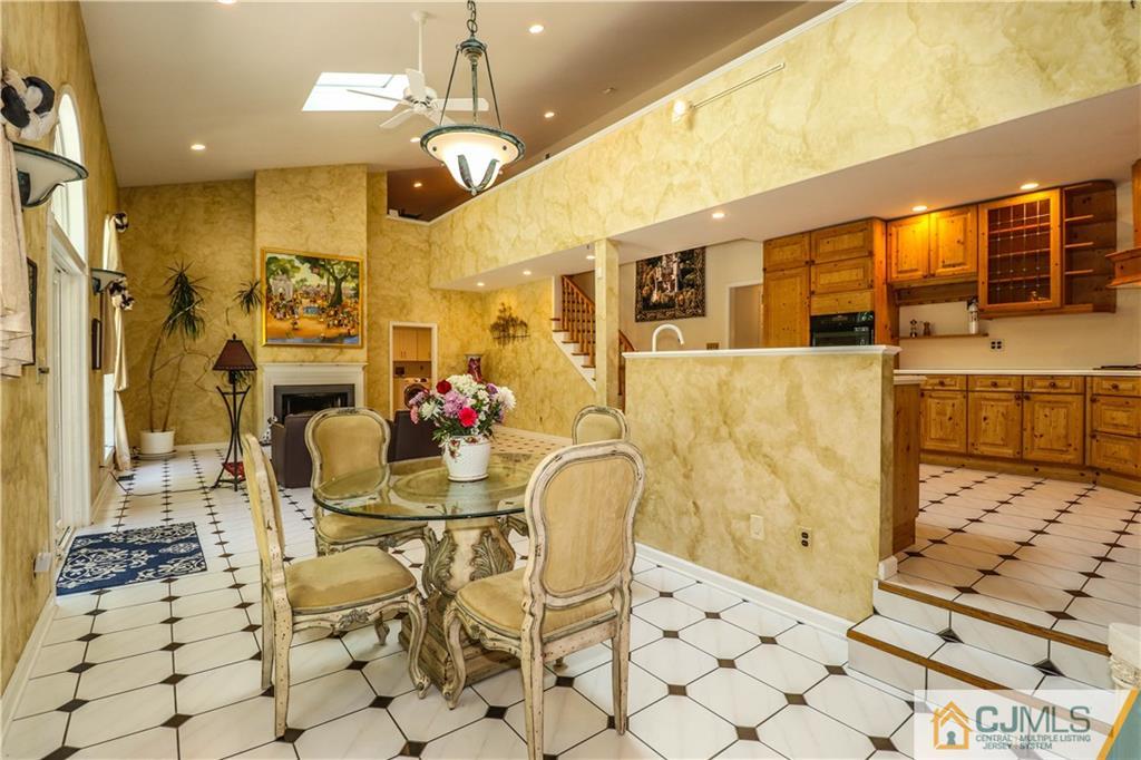 4 Southfield Road Edison, NJ 08820 - Photo 22 of 46 a view of a dining area with furniture