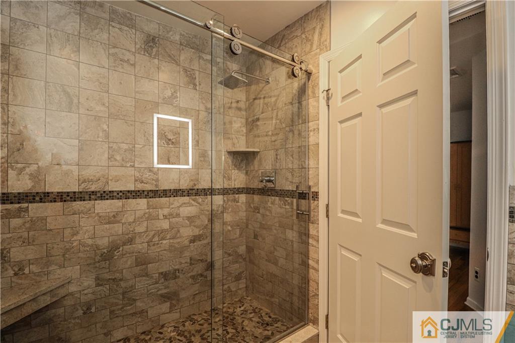 4 Southfield Road Edison, NJ 08820 - Photo 35 of 46 a bathroom with a shower