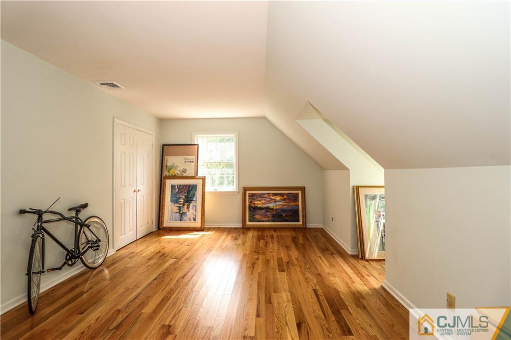 4 Southfield Road Edison, NJ 08820 - Photo 37 of 46 a view of a livingroom with wooden floor