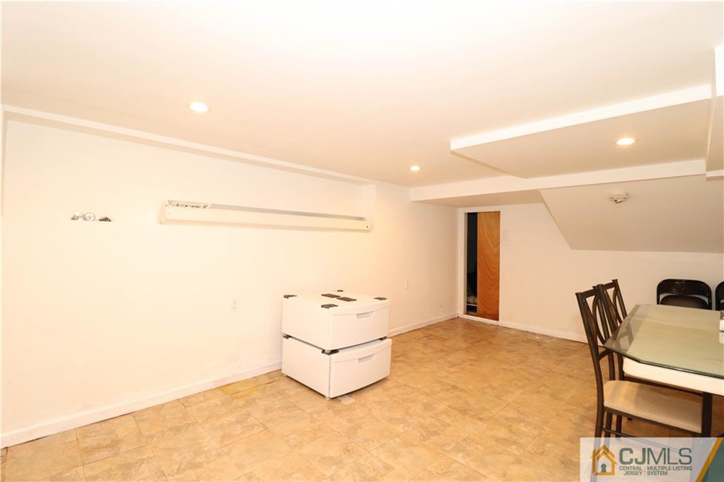 4 Southfield Road Edison, NJ 08820 - Photo 40 of 46 a living room with hard wood floor