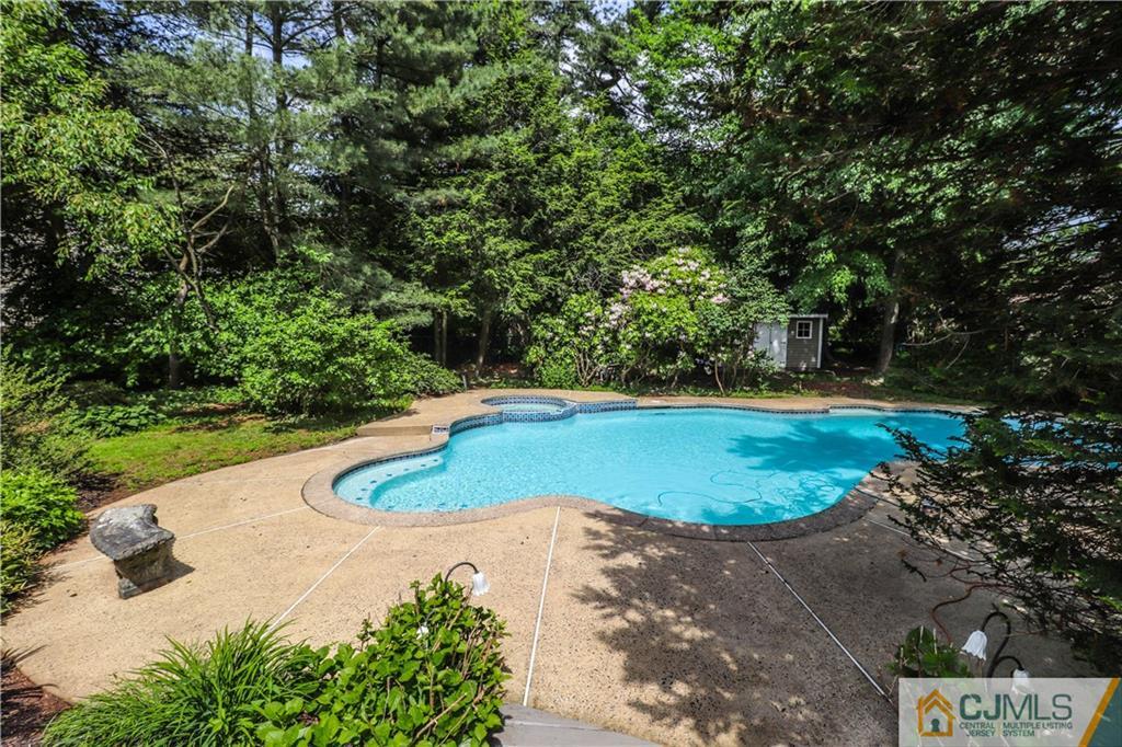 4 Southfield Road Edison, NJ 08820 - Photo 43 of 46 a view of a swimming pool with a yard