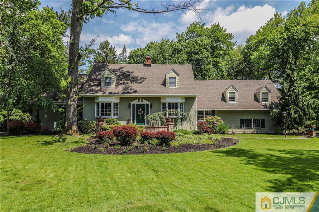 4 Southfield Road Edison, NJ 08820 - Photo 6 of 46 a front view of house with yard and outdoor seating