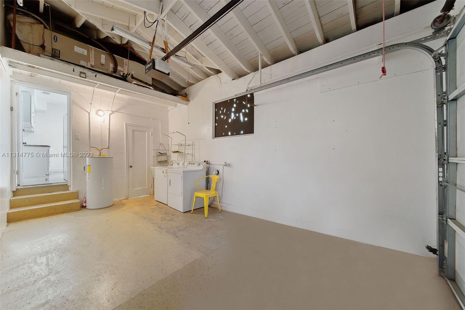 9116 Abbott Avenue Surfside, FL 33154 - Photo 19 of 23 a view of a storage & utility room with a sink