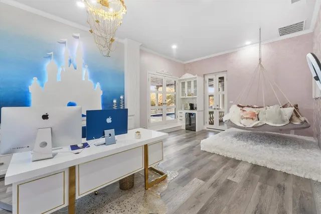 a room with stainless steel appliances kitchen island granite countertop furniture and a view of living room