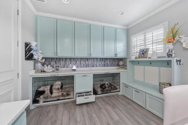 a kitchen with a sink and a stove top oven