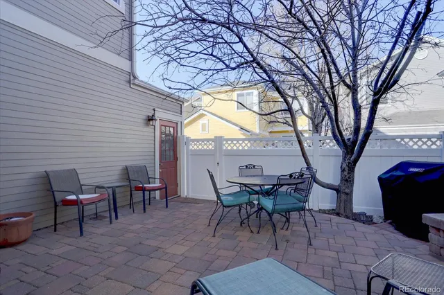 a view of a tables and chairs in the patio