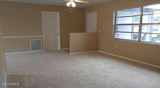 1718 Tuers Road Melbourne, FL 32935 - Photo 2 of 12 Living Room 2