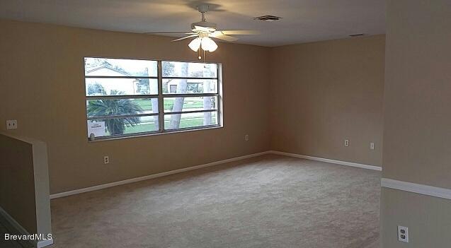 1718 Tuers Road Melbourne, FL 32935 - Photo 3 of 12 Living Room 3
