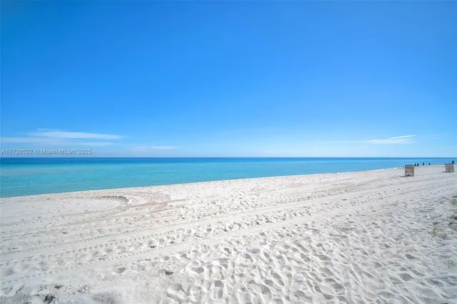 a view of beach and ocean