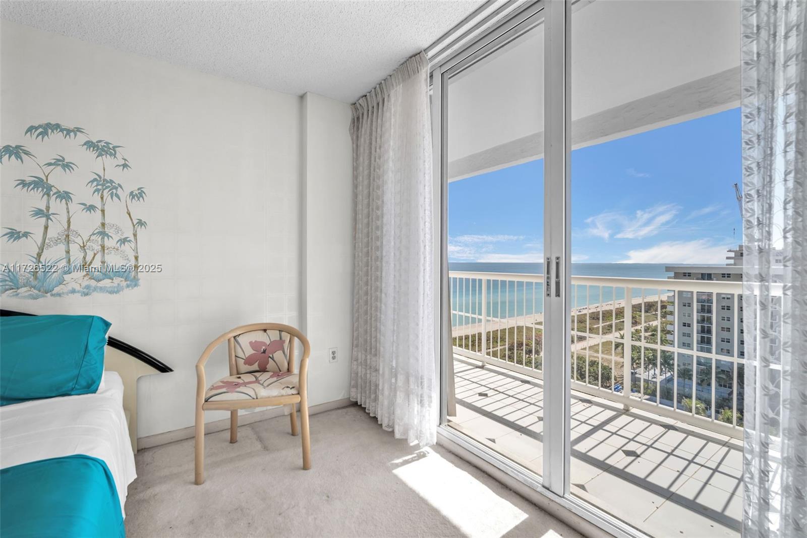 9341 Collins Avenue, Unit 1205 Surfside, FL 33154 - Photo 10 of 29 a view of a bedroom with furniture and a window