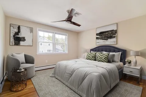 a bathroom with a sink a toilet and shower curtain