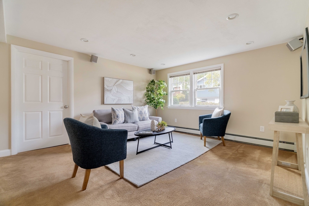 10 Hackensack Terrace Boston, MA 02467 - Photo 21 of 30 a living room with furniture and a window