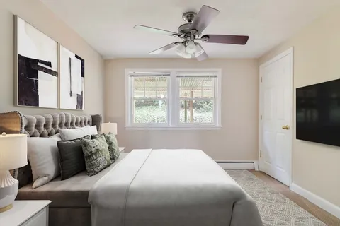 a room with gym equipment and a window