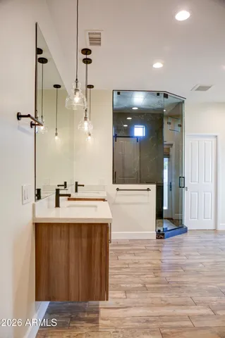 a view of a floor to ceiling window and a garden