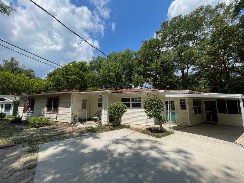133 3rd Street, Unit B Niceville, FL 32578 - Photo 2 of 32 a view of a house with backyard