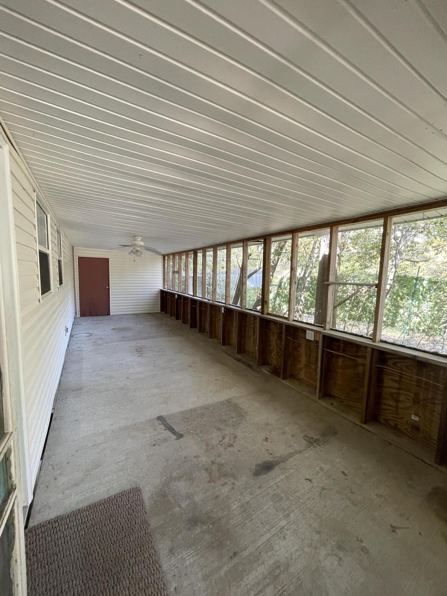 133 3rd Street, Unit B Niceville, FL 32578 - Photo 25 of 32 a view of an empty room with a window