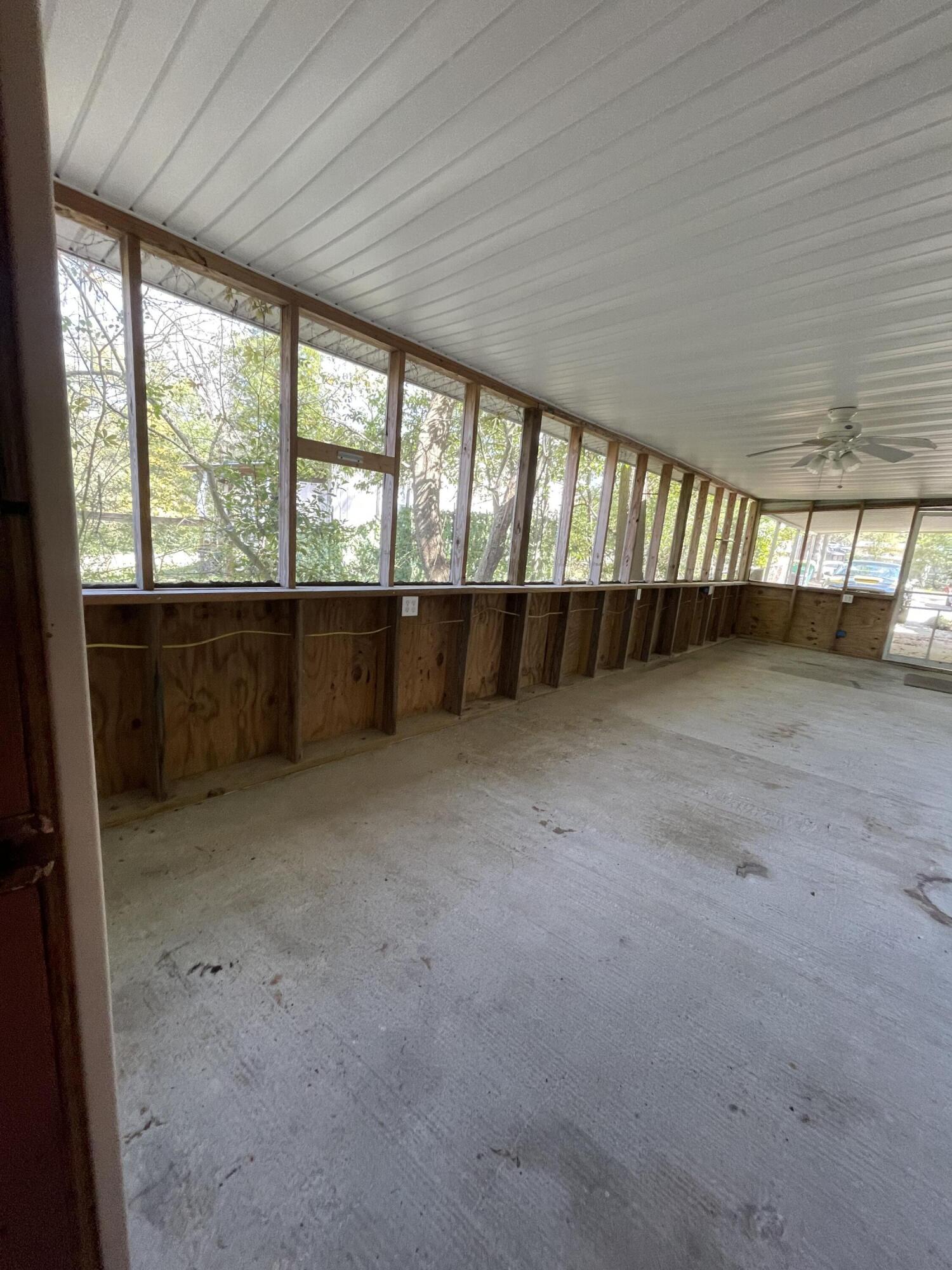 133 3rd Street, Unit B Niceville, FL 32578 - Photo 26 of 32 a view of an empty room with a window