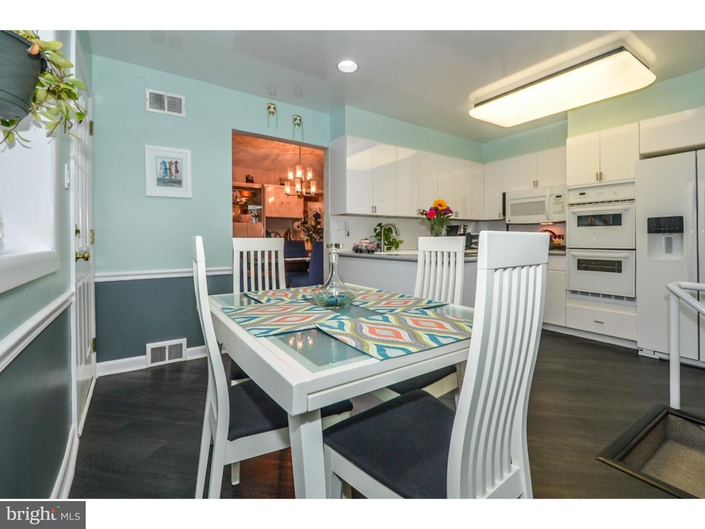 209 Radburn Road Philadelphia, PA 19115 - Photo 10 of 24 a view of a dining room with furniture and wooden floor